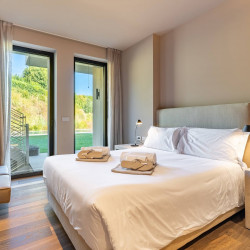 Bedroom at Villa Belvedere with view over the garden