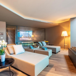 Wellness room at Villa Belvedere with relaxation beds and soft lighting