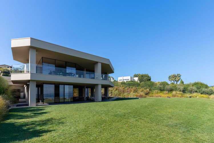 Aerial view of Villa Belvedere with pool and gardens near Lake Garda