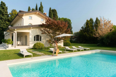 Private outdoor pool at Villa Preone, Lake Garda, surrounded by gardens