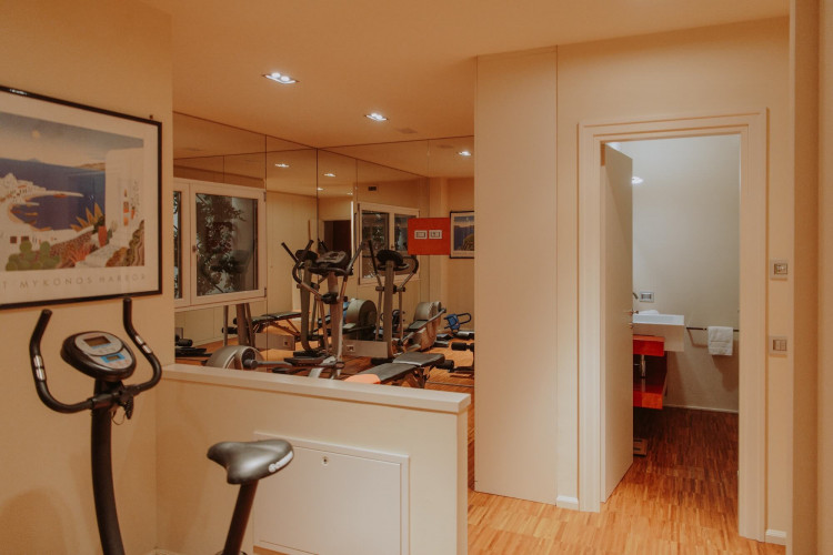Modern gym at Villa Preone, Lake Garda, with fitness equipment
