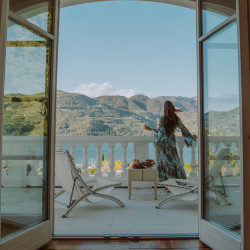 Stylish bedroom with lake view terrace at Villa Preone, Salò