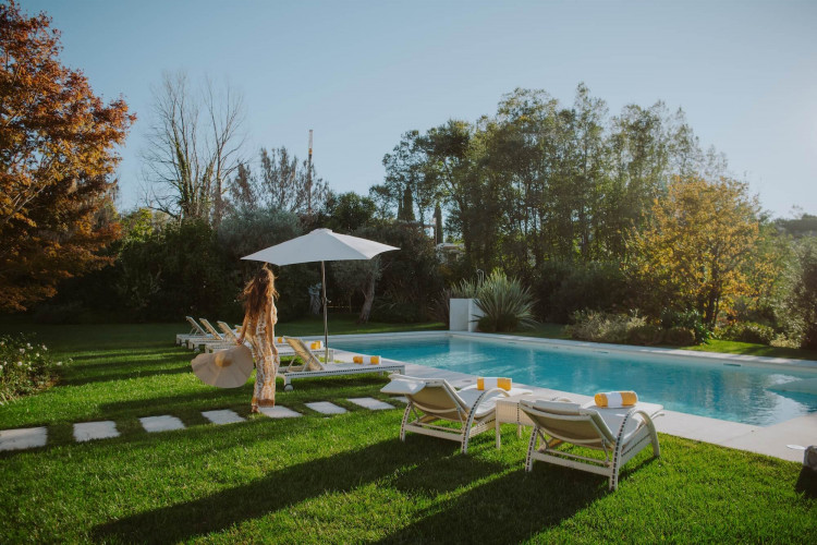 Private outdoor pool at Villa Preone, Lake Garda, surrounded by gardens